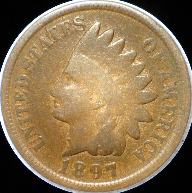 Close-up of DDR-001 Doubled Die Reverse on 1897 Indian Head Penny showing doubling on ONE CENT lettering and wreath elements